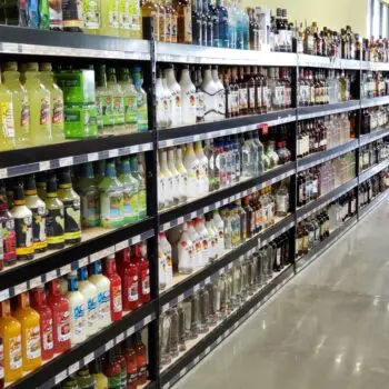 Store shelves with assorted bottles