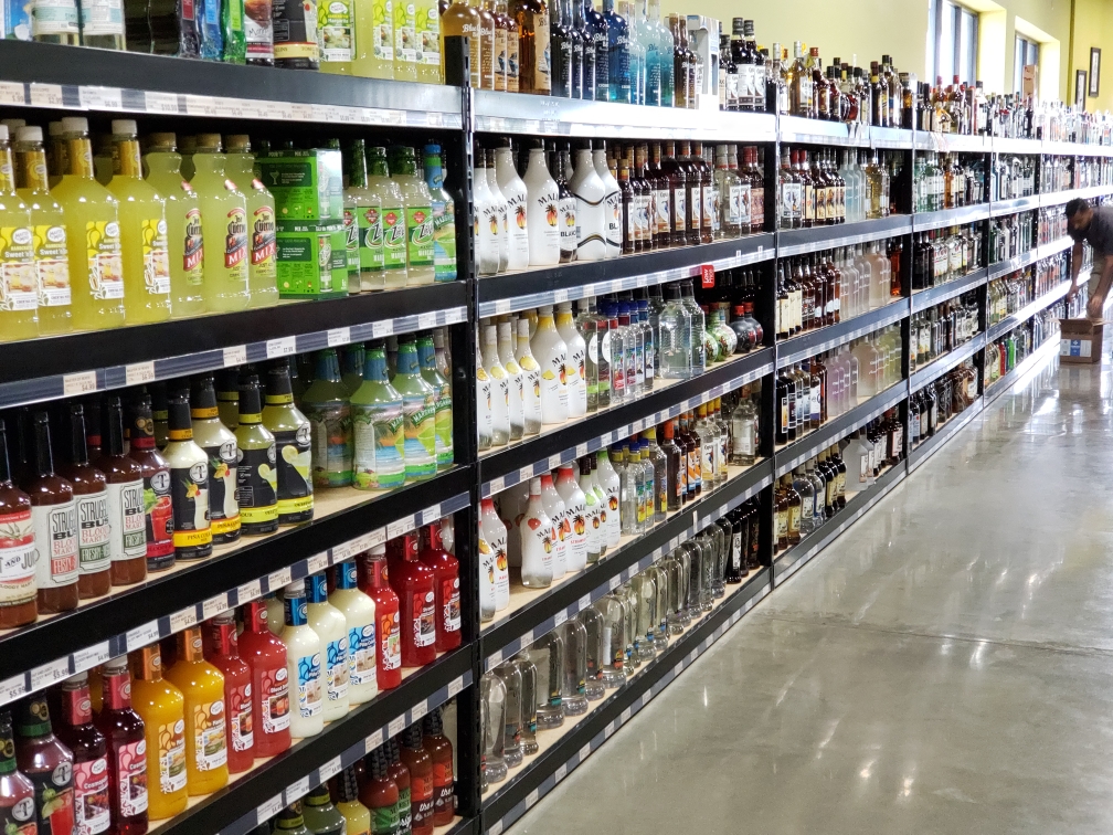 Store shelves with assorted bottles